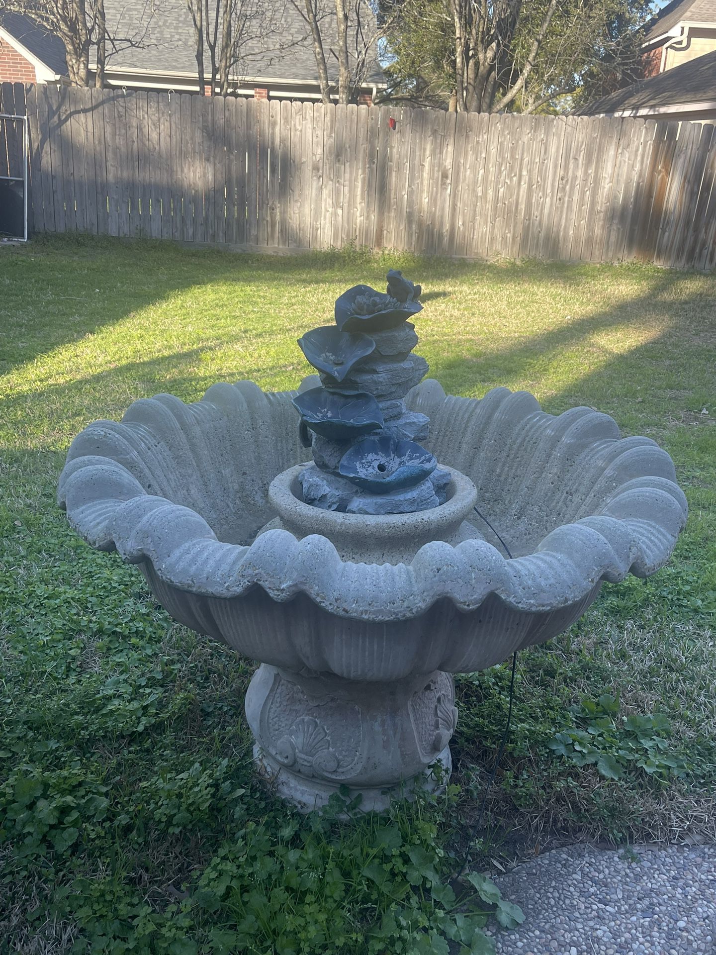 Outdoor Water Fountain With Two Benches