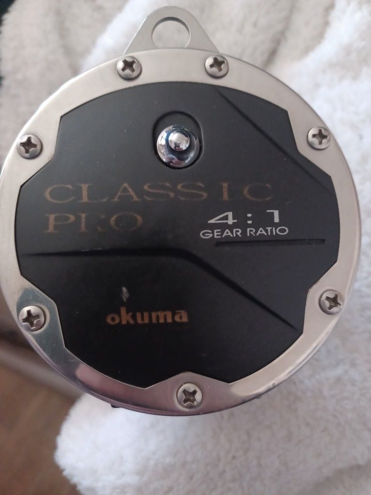 CARRETE OKUMA CLASSIC PRO CL 552W $40, FIRM. 