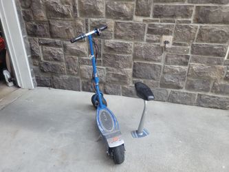Razor E300 converted to 40 volt Dewalt batteries (2×20volts) up to 25 mph.