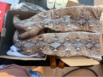 Thigh high boots snake print