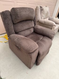 Brown motorized rocker recliner