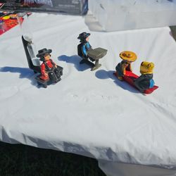 Cast Iron minatures One Has A Timer.  Red Sled With  Boy And Girl  At Casr Iron