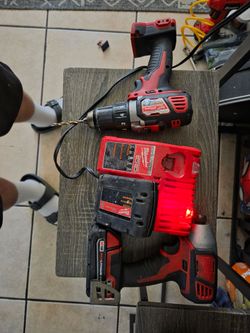Milwaukee drill and Milwaukee drill impact + charger + battery $200