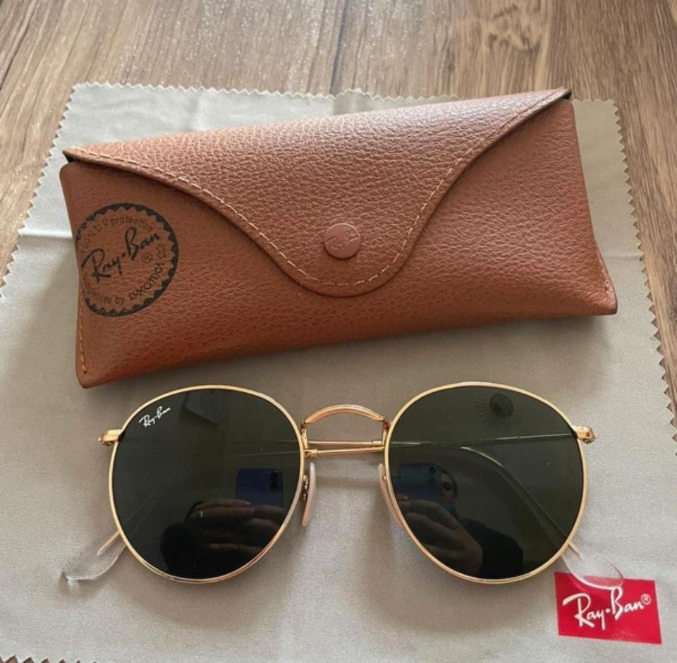New gold ray-ban sunglasses.