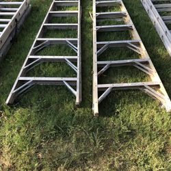 Husky brand  and Werner brand medium metal ladders 