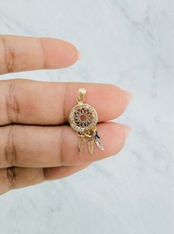 ✨ 14K Gold Dream Catcher Pendant ✨  A small, dainty dream catcher charm in real 14K gold with a feather accent and sparkling white cubic zirconia. In 