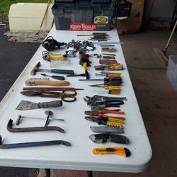 Assorted tools with toolbox.