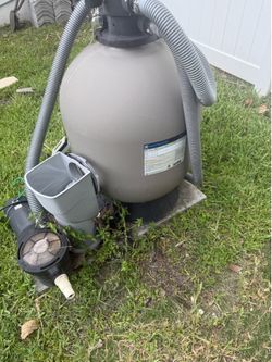 Above ground sand filter and pump