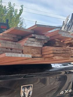 Lot of Rough Cut Redwood Lumber Boards