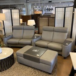 Erickson’s Stressless 4 Seat Grey Leather Theater Sofa