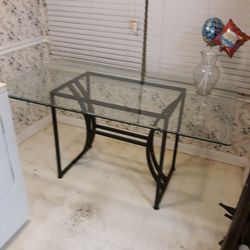 HEAVY DUTY GLASS TABLE LEFT TO RIGHT 5FT FRONT TO BACK 3FT TOP TO BOTTOM 29IN 