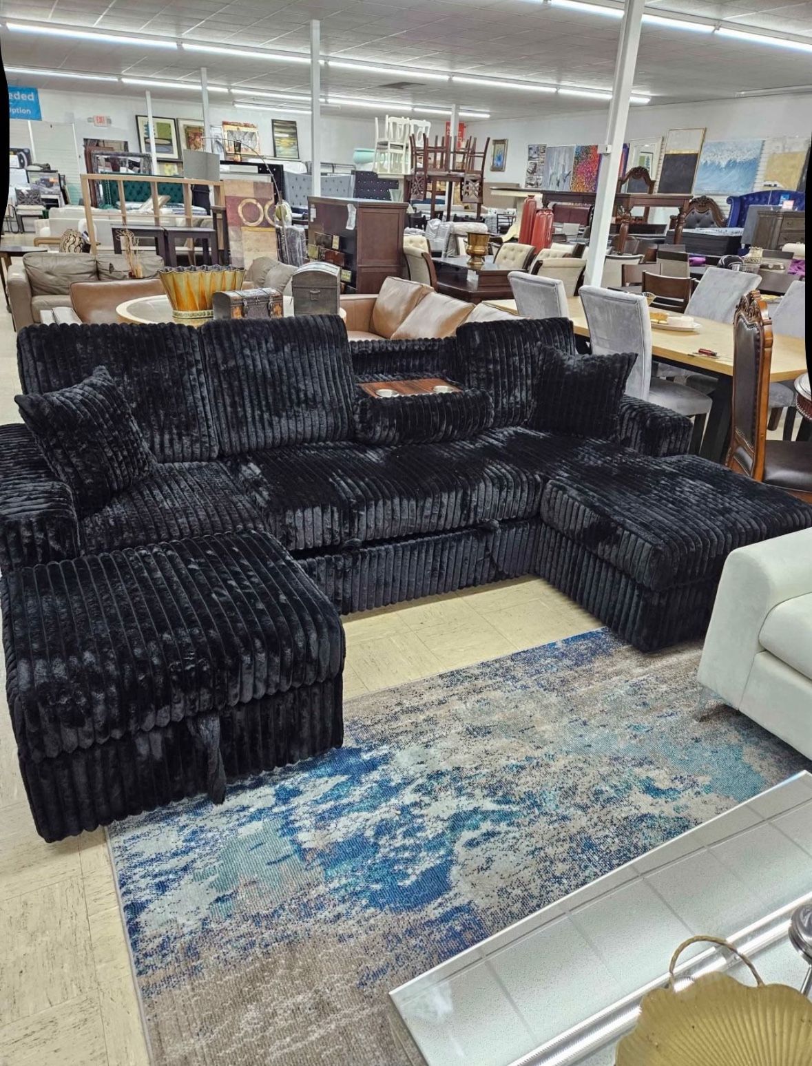 Black or gray brand new pullout sectional with Otman and built-in storage space