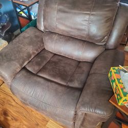 Brown Plug In Recliner 