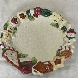 World Bazaars Hand-painted ceramic holiday serving plate with gingerbread and snowman motifs. 12”