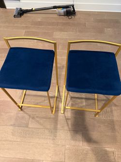 World Market Blue velvet bar stools