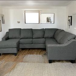 This Sectional U-shaped sofa is Compack & Comfy. We Deliver.