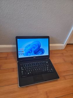 dell laptop 14 inch i5 8gb ram 256gb ssd, charger and ms office and adobe or best offer