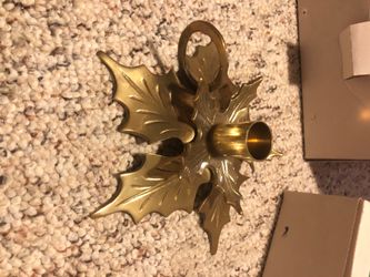 Brass holiday candle sticks. Holly leaf design