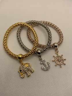 SET OF 3, MULTITONE CHARM BRACELETS