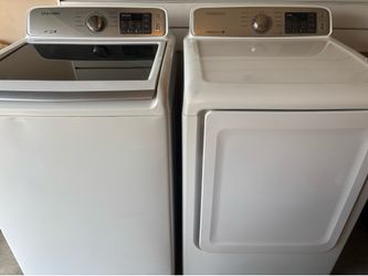 Moving sale. Washer and electric dryer set-large capacity
