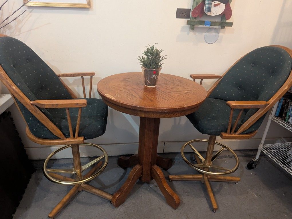 2 Swivel Bar Stools and a Bar Table