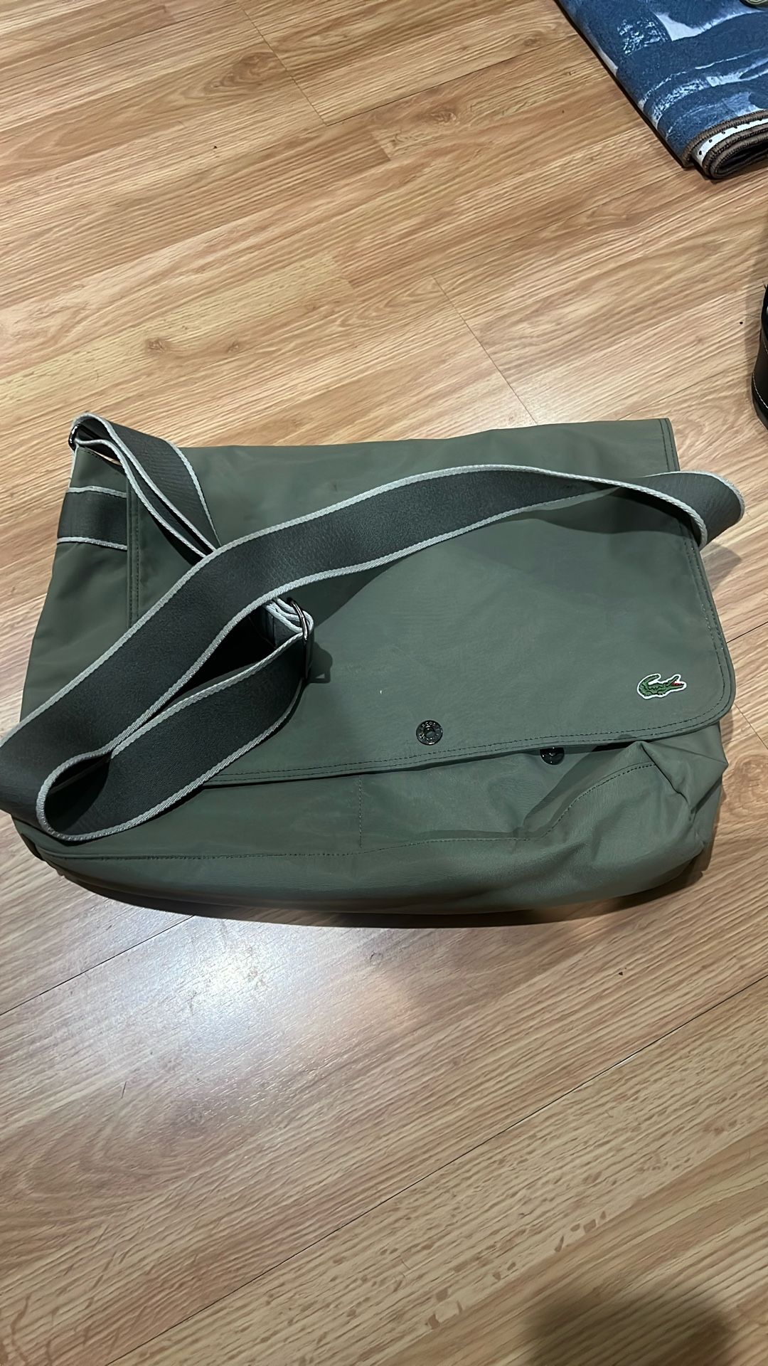 Gently used Lacoste Messenger Bag