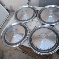 4  1(contact info removed)  Cadillac Hubcaps