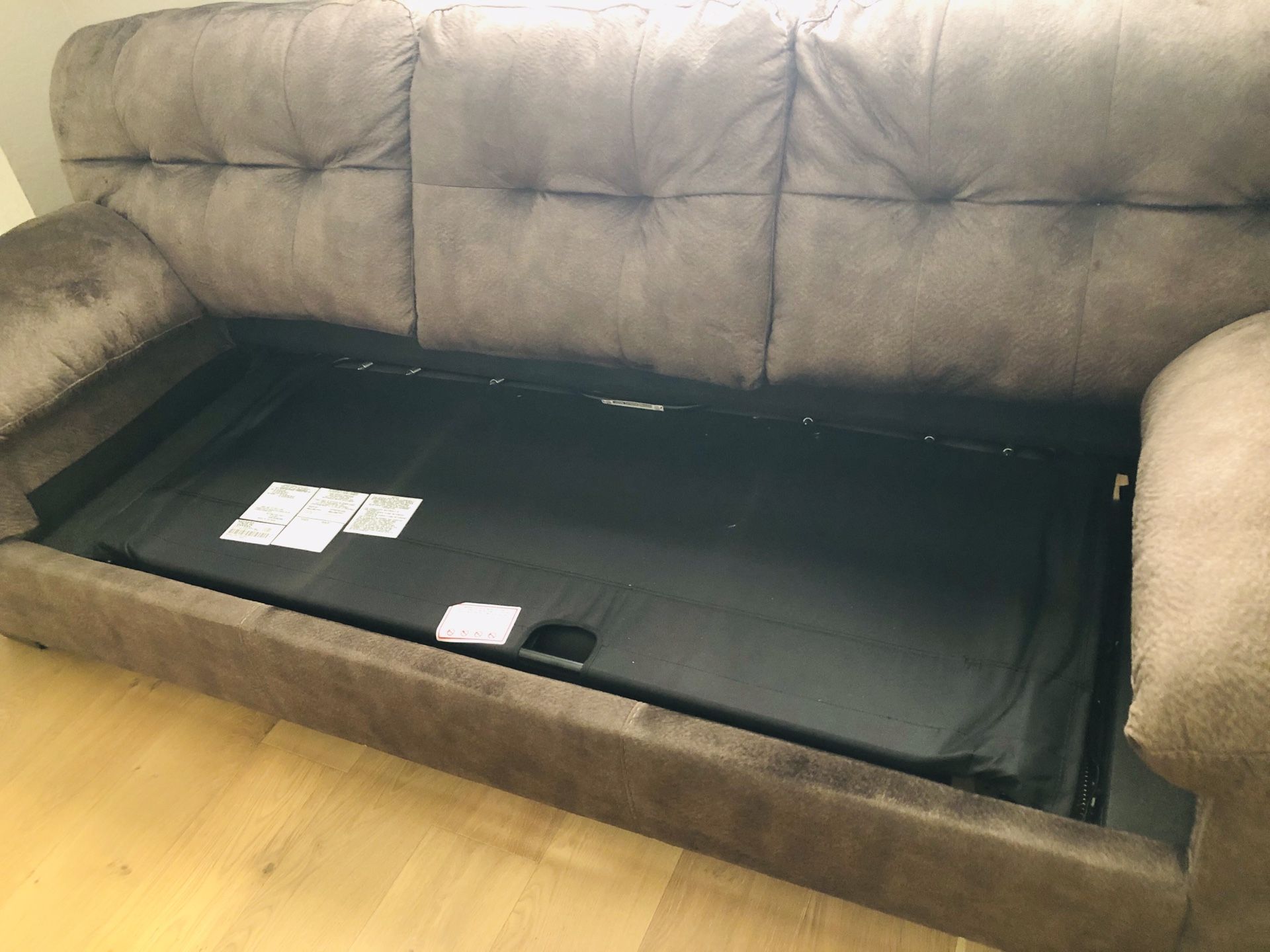 Sofa sleeper with four more years warranty. Moving sale ASAP!