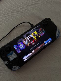 Steam Deck OLED 512GB + skin + screen protector (adult owned)