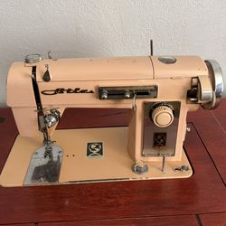 1950’s Wizard Atlas pink sewing machine