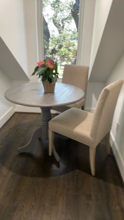 Gray wood table and chairs high end chairs are Crate and Barrel!!