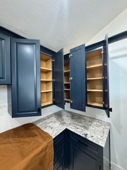 (7) 42” & (1) 18” American Woodmark upper cabinets $750 OBO