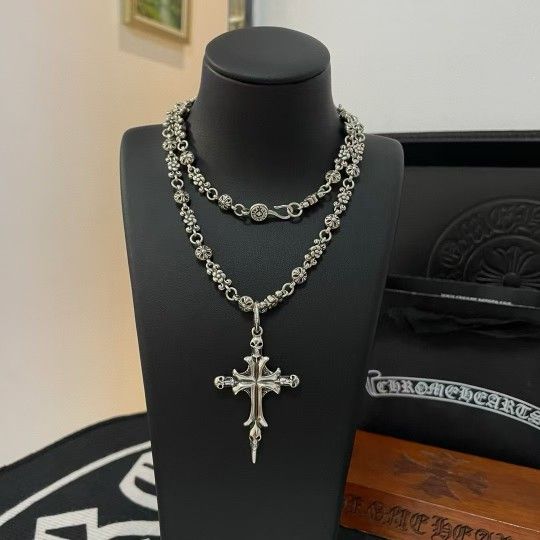 Chrome Hearts cross pendant necklace; cross pendant necklace