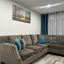 Grey Couch With Blue And Grey Pillows