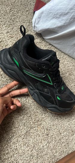 Green and black reeboks