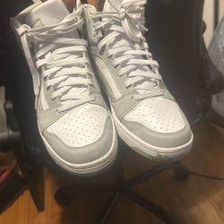 Puma Rebound V6 sneaker in white and grey