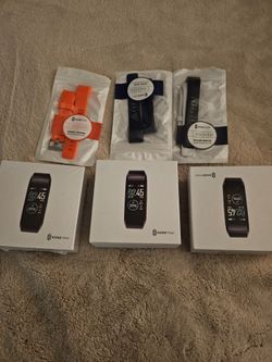 KoreTrak watches and 3 changeable bands
