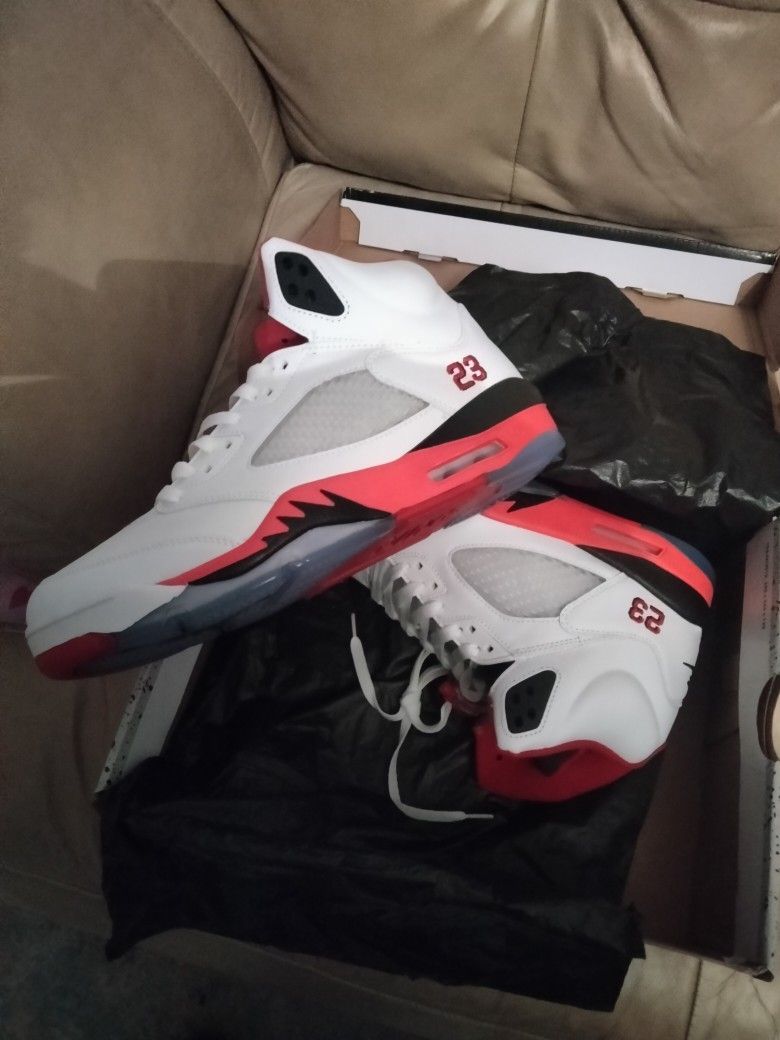 The Air Jordan 5 “Fire Red” with Black Tongue