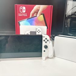 nintendo switch oled with grip and 128 gb extra