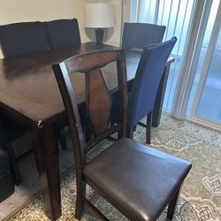 Dining Table With Four Chairs