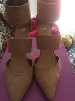 Beige suede pumps