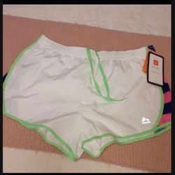 Ladies workout shorts. Both are Size L, brand new with tags
