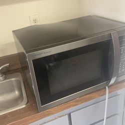 Item: Sharp Carousel Stainless Steel Microwave