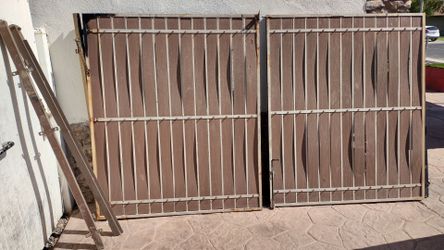 Black metal door gate wood panel size. 10'feet wide X 6'feet tall :$ 370.