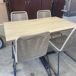 Table And 4 Chairs