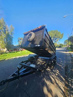 NEW DUMP TRAILERS 12x8x4 ROLLING TARP AND SPARE TIRE 2026 YEAR ELECTRIC BRAKES LIGHTS REMOTE CONTROL TITLE IN HAND READY FOR WORK,se habla ESPAÑOL