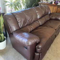 Leather couch w/ reclining seats