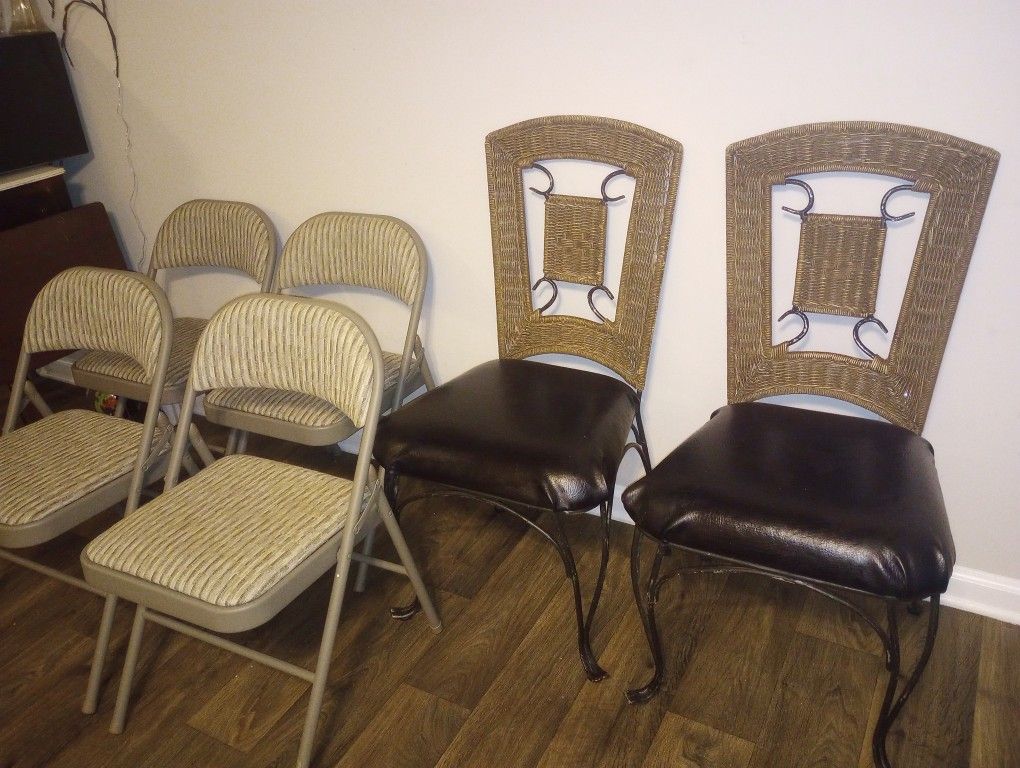 4 Cast Iron & 4 Folding Chairs