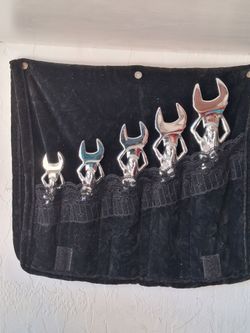 A set of novelty wrenches for your shop of the girls , they are actually wrenches , but the top part , you can
