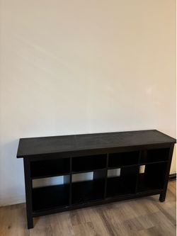 Tv console storage shelf